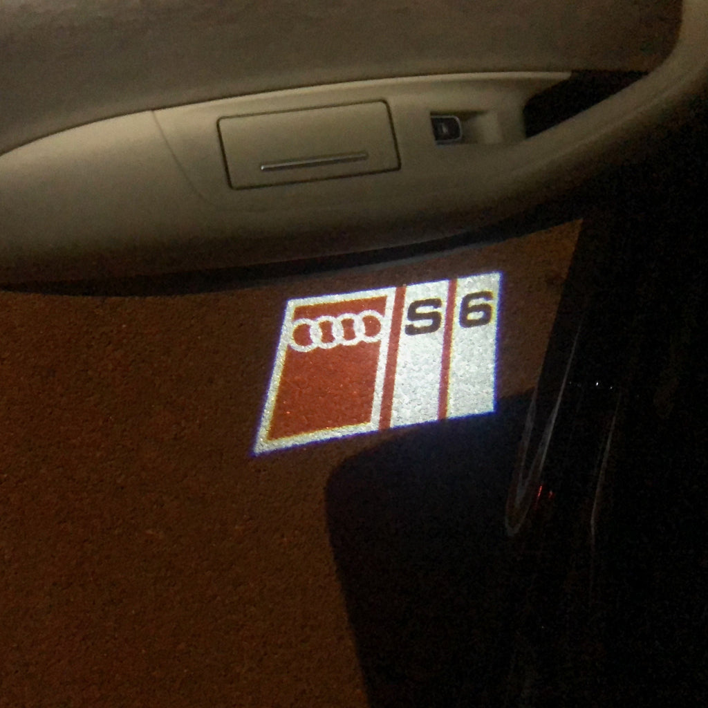 AUDI LOGO PROJECTOT LIGHTS Nr.150 (الكمية 1 = 2 Logo Films /2 أضواء الباب)
