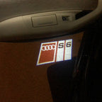 AUDI LOGO PROJECTOT LIGHTS Nr.150 (الكمية 1 = 2 Logo Films /2 أضواء الباب)