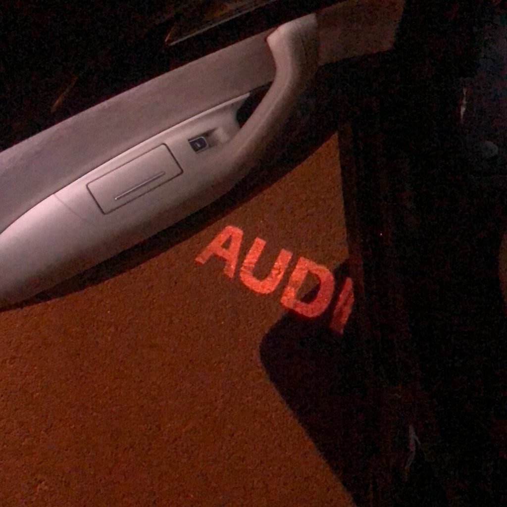 AUDI LOGO PROJECTOT LIGHTS Nr.07 (Menge 1 = 2 Logofolien /2 Türleuchten)