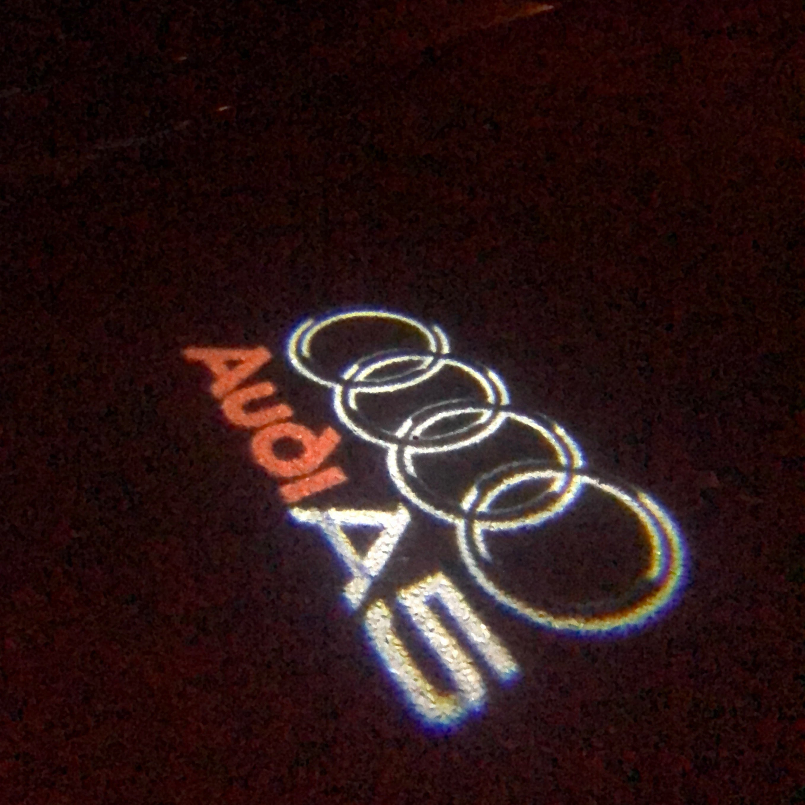 AUDI LOGO PROJECTOT LIGHTS Nr.43 (الكمية 1 = 2 Logo Films /2 أضواء الباب)