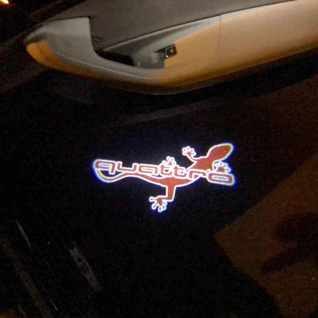 AUDI QUATTRO GECKO LOGO PROJECTOT LIGHTS Nr.63 (Menge 1 = 2 Logofolien /2 Türleuchten)