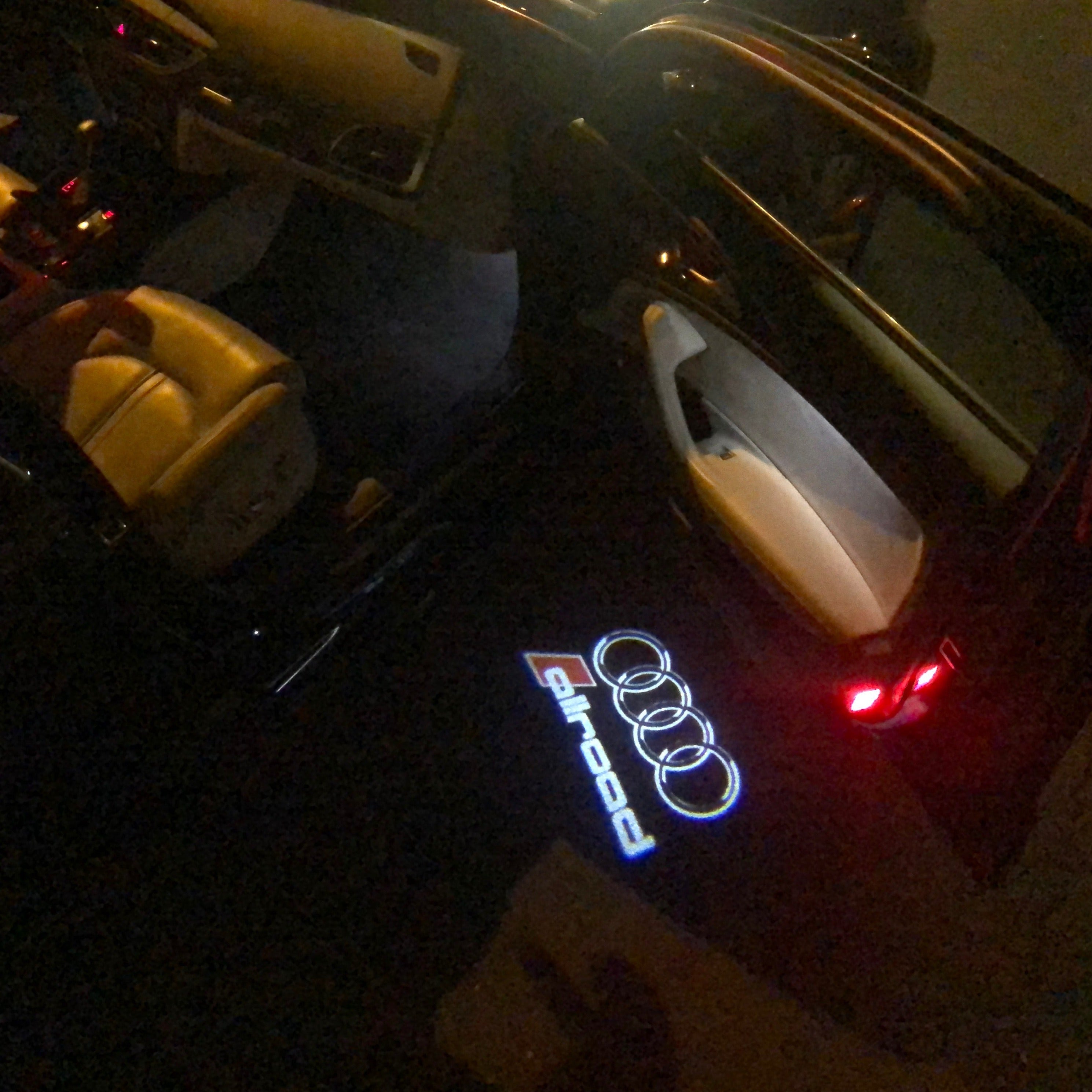 AUDI LOGO PROJECTOT LIGHTS Nr.146 (الكمية 1 = 2 Logo Films /2 أضواء الباب)