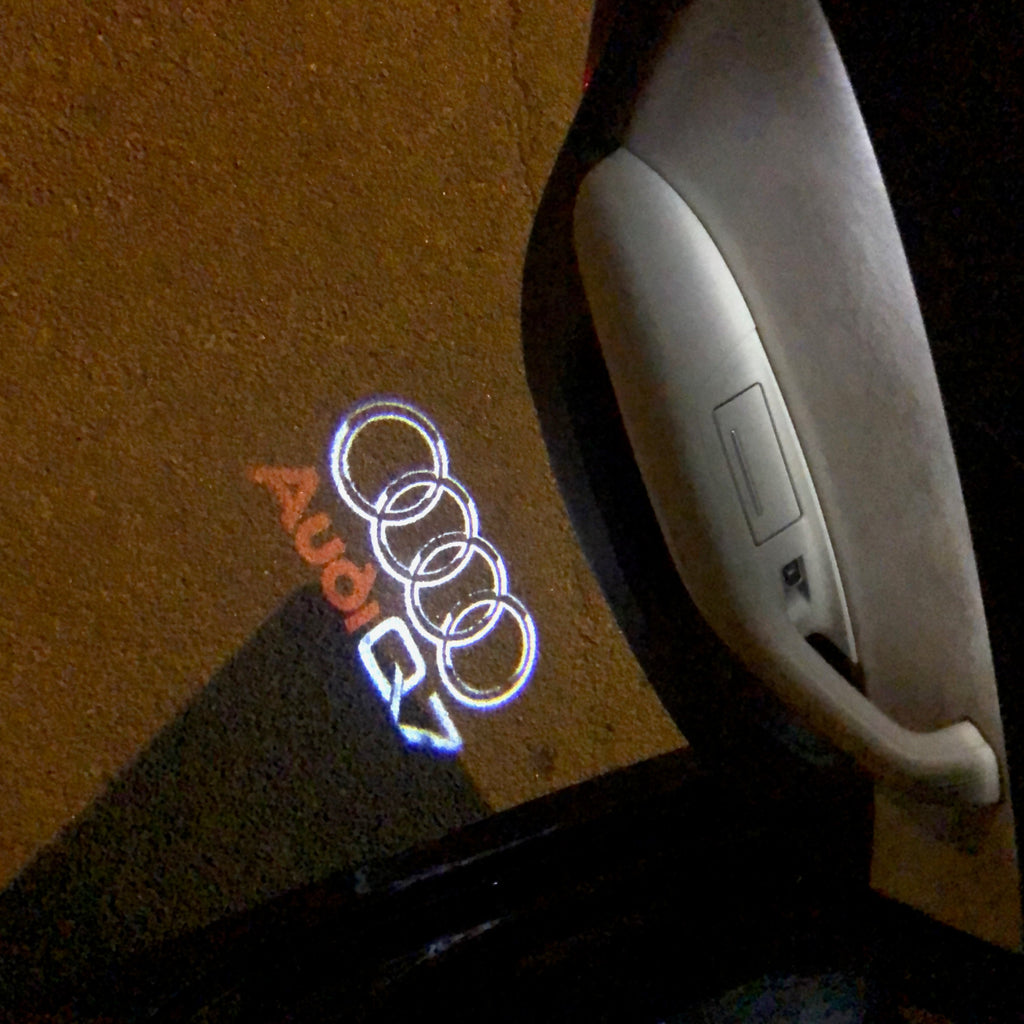 AUDI LOGO PROJECTOT LIGHTS Nr.49 (Menge 1 = 2 Logofolien /2 Türleuchten)