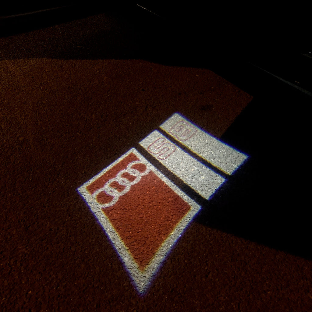 AUDI LOGO PROJECTOT LIGHTS Nr.103 (الكمية 1 = 2 Logo Films /2 أضواء الباب)