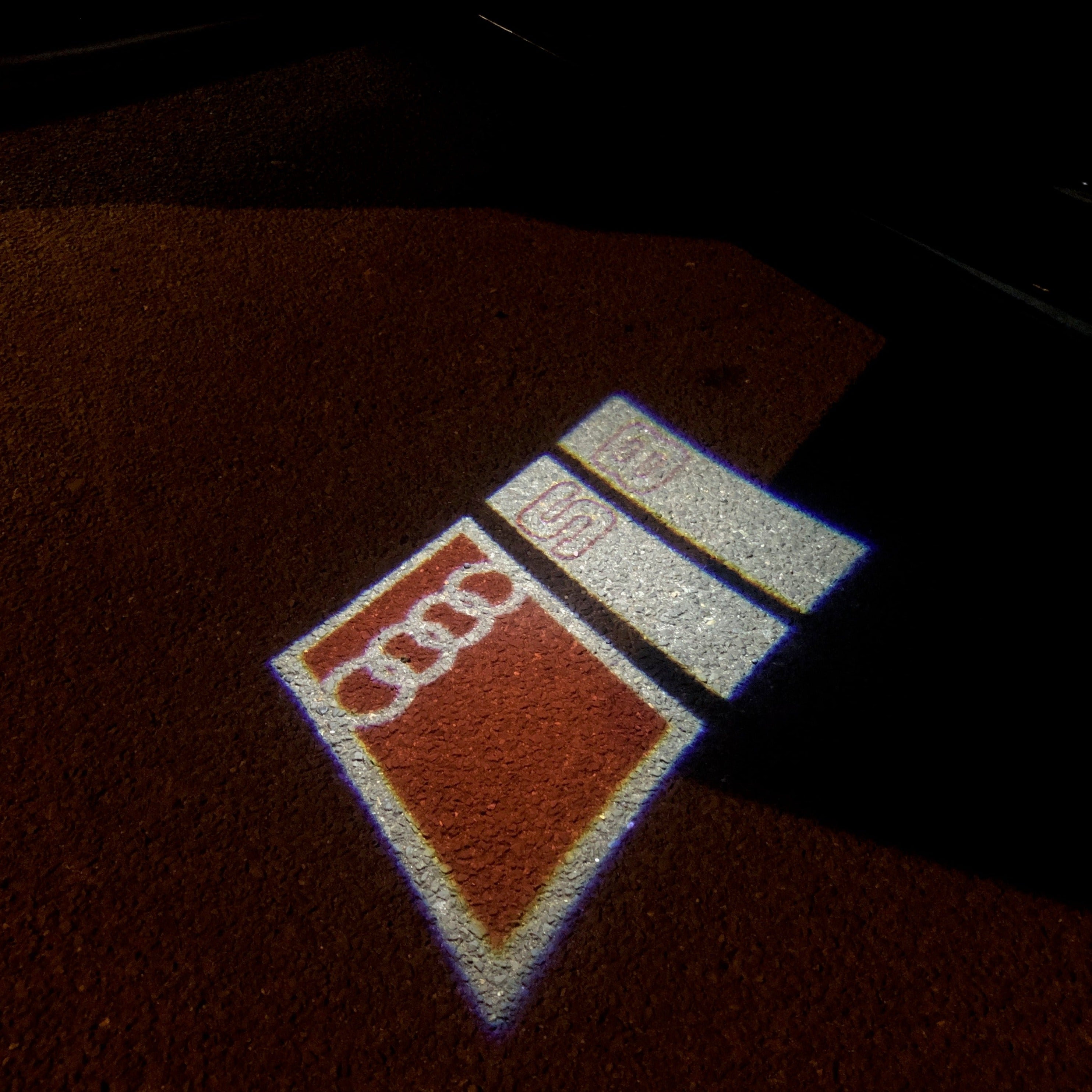 AUDI LOGO PROJECTOT LIGHTS Nr.103 (الكمية 1 = 2 Logo Films /2 أضواء الباب)