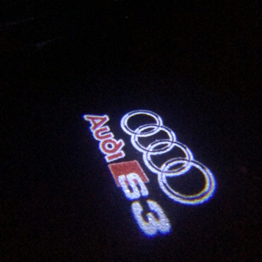 AUDI LOGO PROJECTOT LIGHTS Nr.33 (الكمية 1 = 2 Logo Films /2 أضواء الباب)