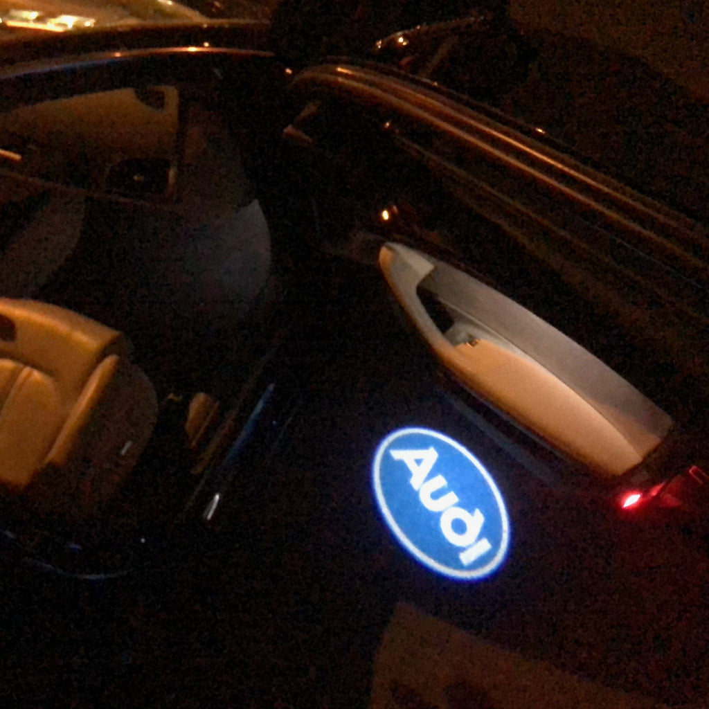 AUDI LOGO PROJECTOT LIGHTS NR. 116 (الكمية 1 = 2 Logo Films /2 door lights）