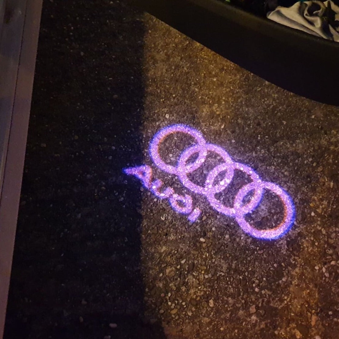 AUDI LOGO PROJECTOT LIGHTS Nr.06 (Menge 1 = 2 Logofolien /2 Türleuchten)