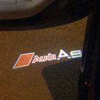 AUDI LOGO PROJECTOT LIGHTS Nr.40 (Menge 1 = 2 Logofolien /2 Türleuchten)