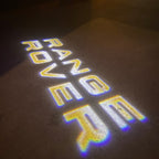LUCI PROIETTORI LOGO Land Rover Nr.04 (quantità 1 = 1 set / 2 luci porta)